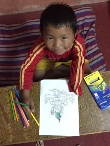 Jigme happy studying at HKH